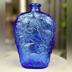 Beautiful vintage 1970’s cobalt blue, with seashells glass bottle.